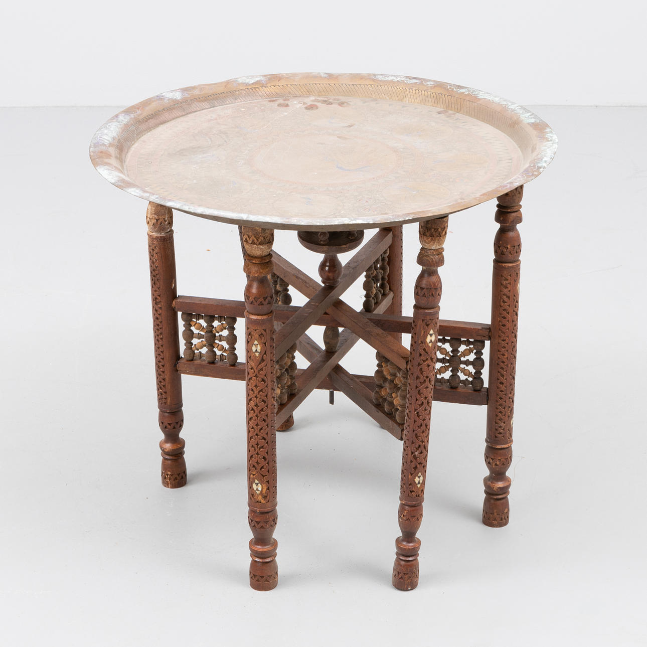 SMOKING TABLE, folding base with brass top, 20th century.