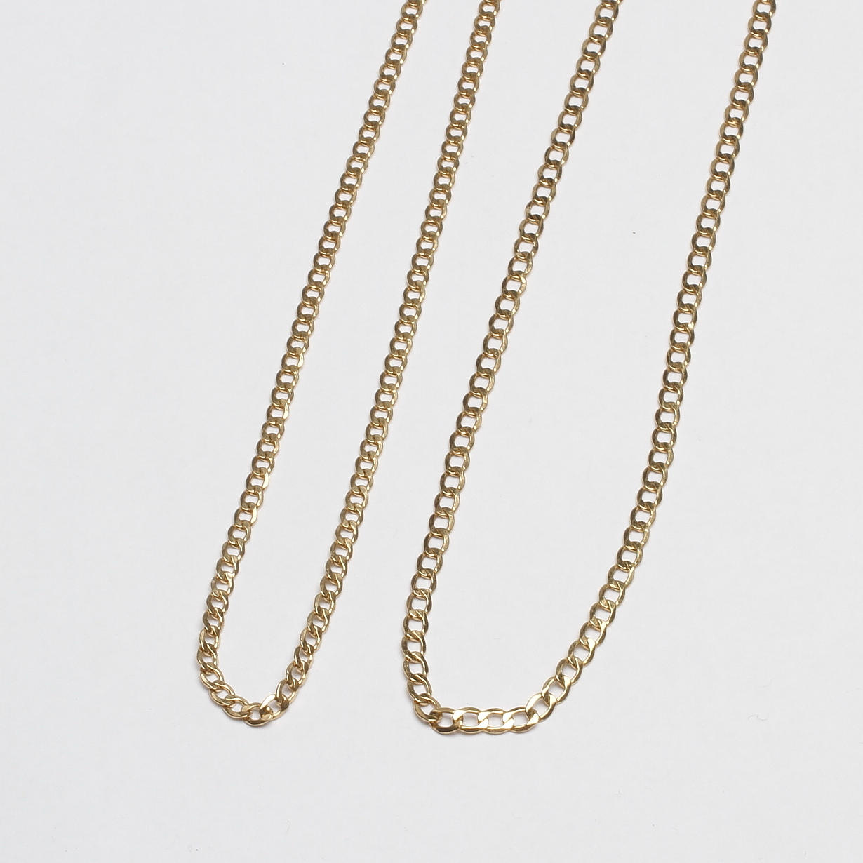 HALSKEDJOR, 2 st, 14k guld, vikt ca 7,2 gr.