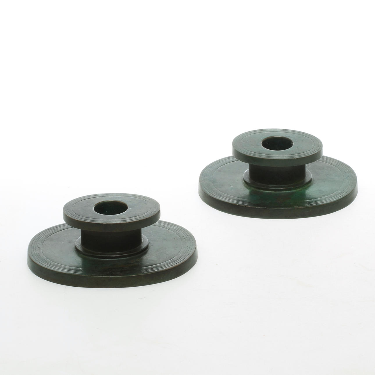 LJUSSTAKAR, ett par, GAB brons, 1900-talets först hälft.