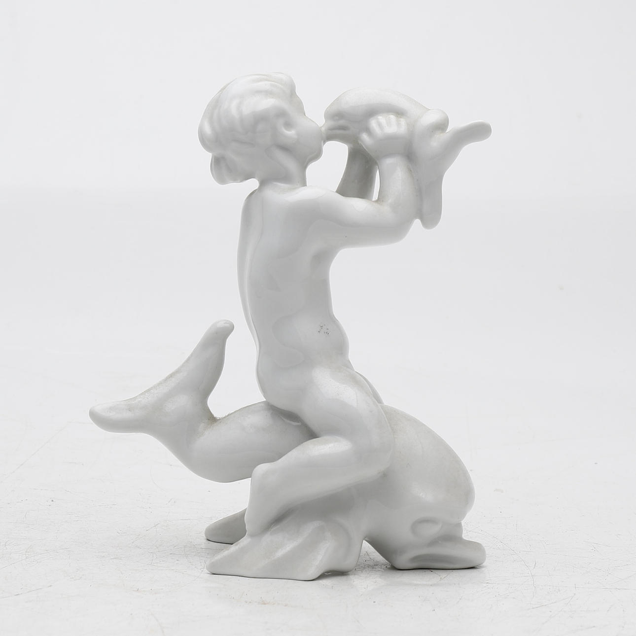 KAI NIELSEN. “Niño con delfines”.