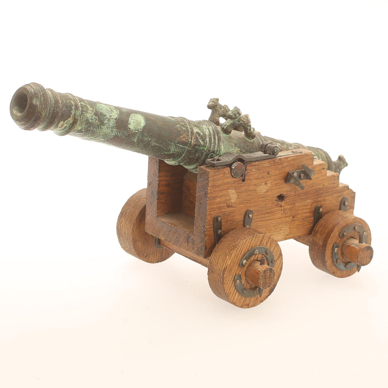 TABLE CANNON, wood and bronze.