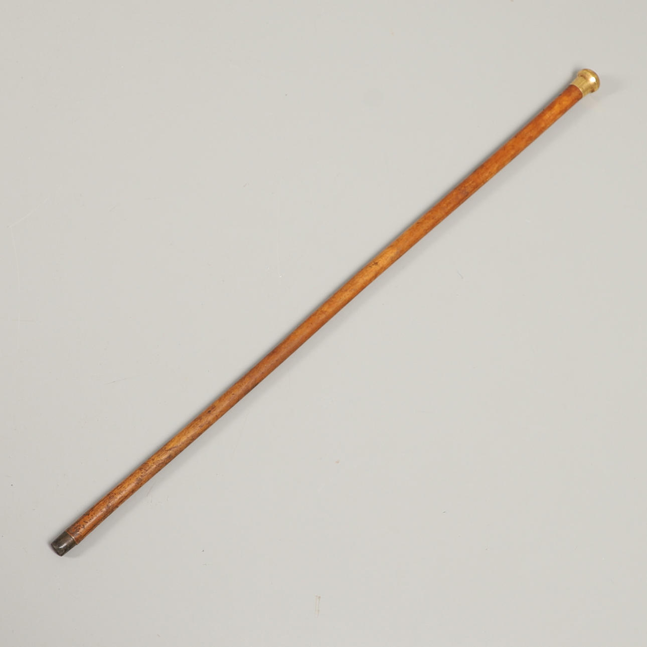 A VICTORIAN 18CT GOLD TOPPED MALACCA WALKING CANE.