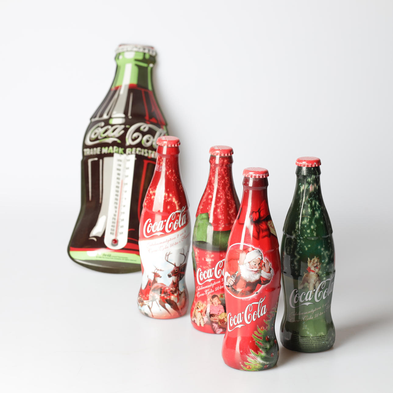 COCA-COLA, 5 partes, botellas y termómetro, años 2000.