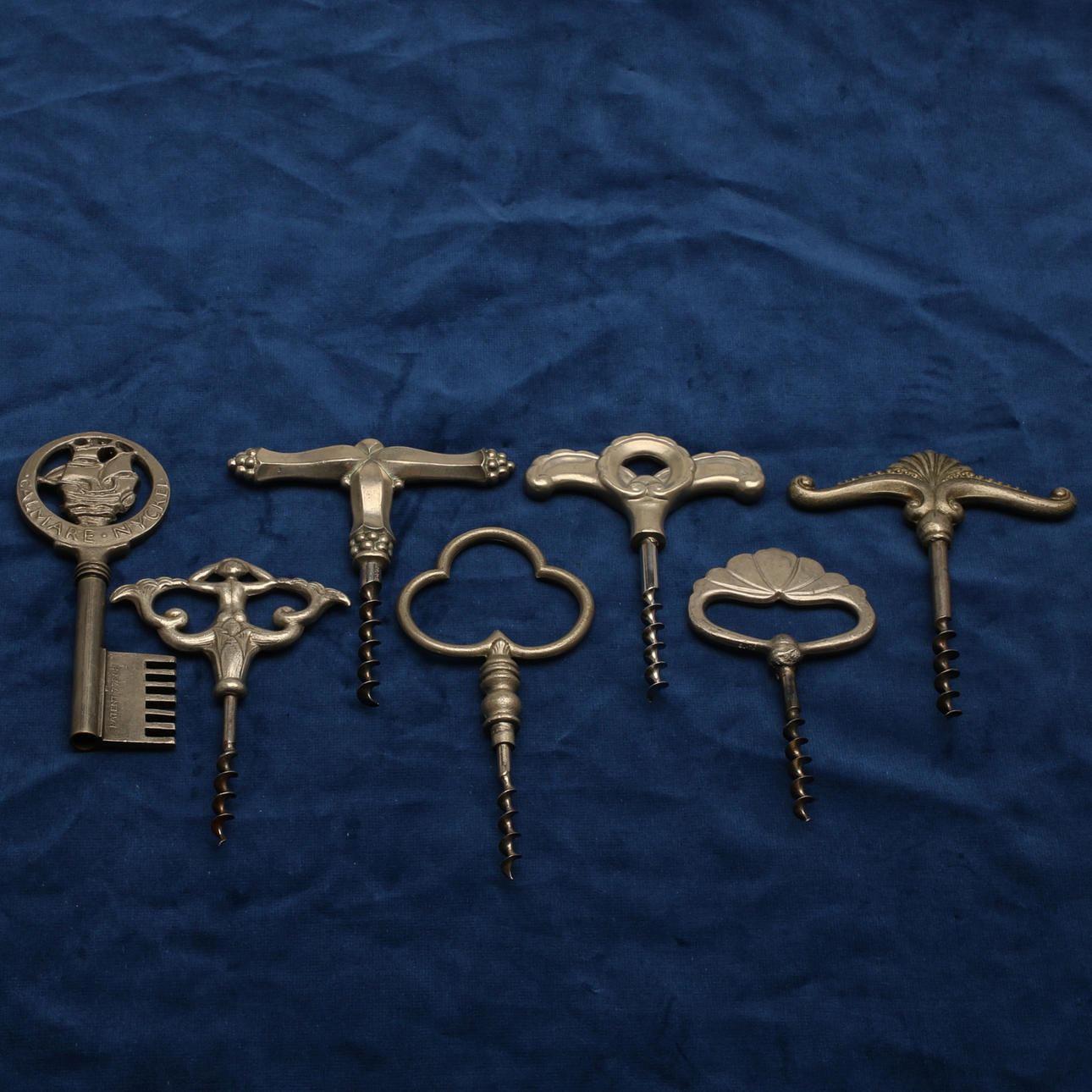 KORKSKRUVAR, 7 st, tenn, m.m, 1900-talets första hälft.