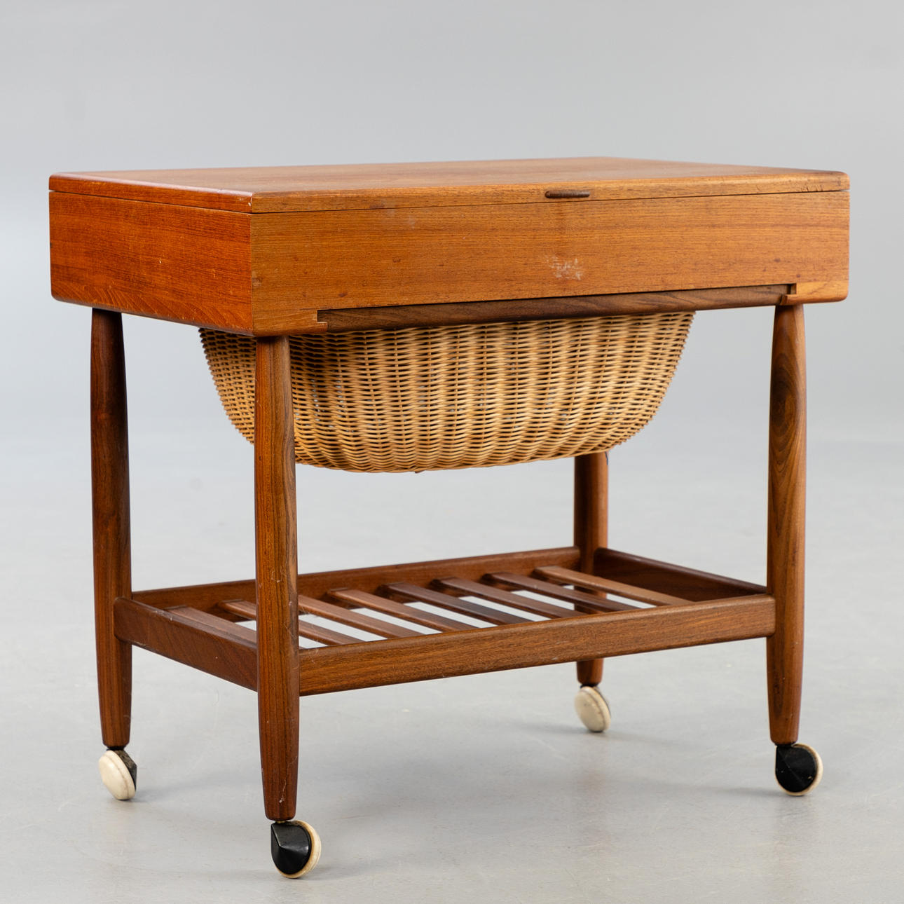 EJVIND JOHANSSON. Vitzé, teak sewing table, 1960s.