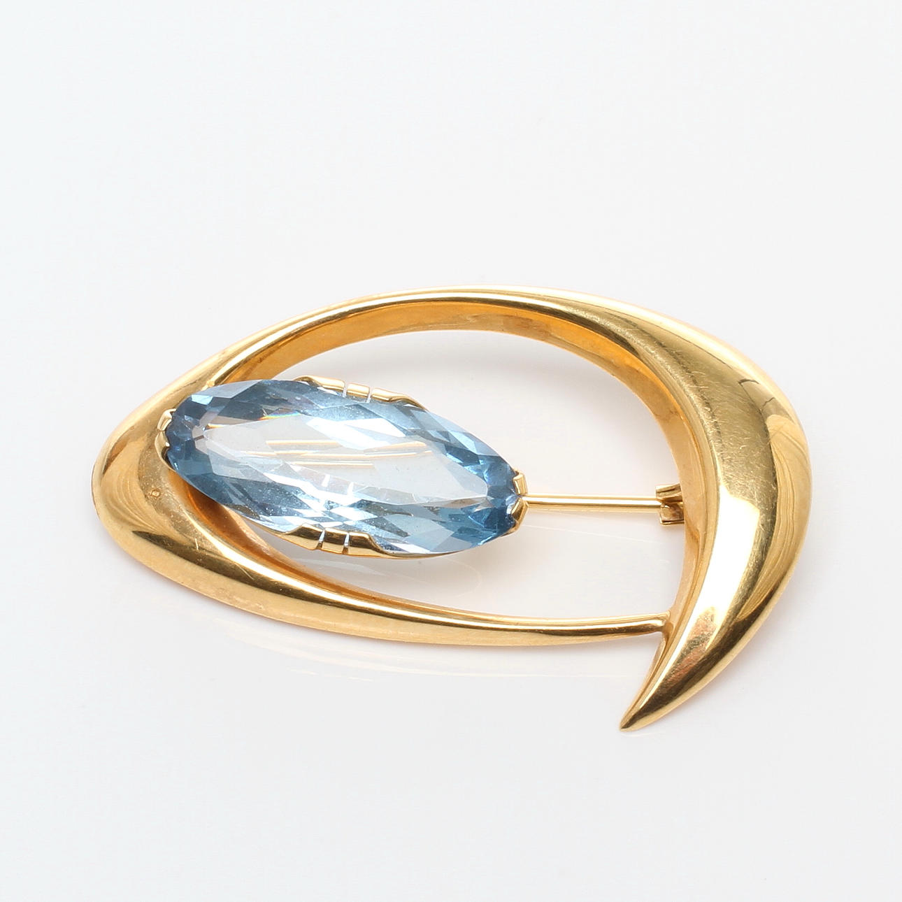 BROSCH, 18k guld med blå sten, 1900-tal.