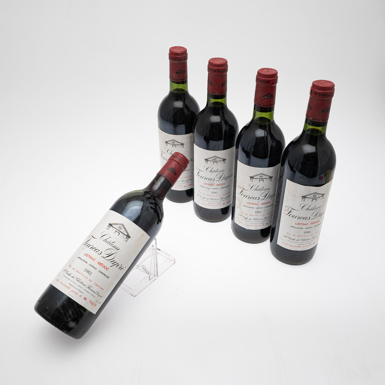 SAMLING VIN/RÖTT VIN, fem flaskor, Château Fourcas Dupré, 1982 ...