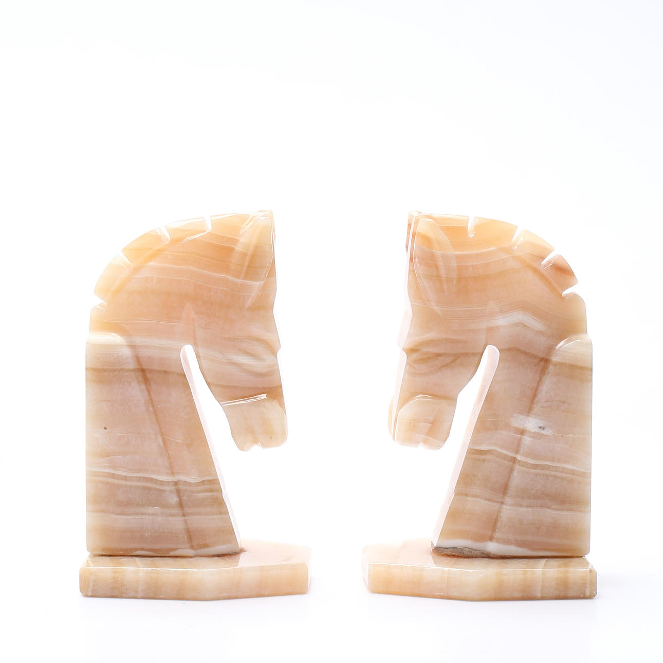 BOGSTØTTER, et par, alabast, 1900-tallet.
