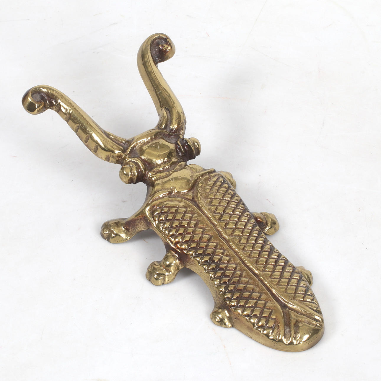 SKOKNEKT, mässing, 1900-tal.