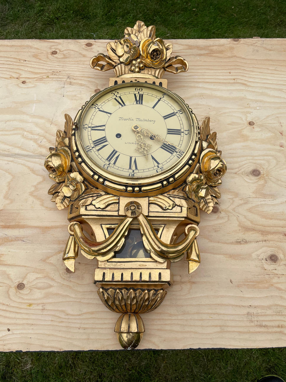 WALL CLOCK, gilded and bronzed, 20th century.