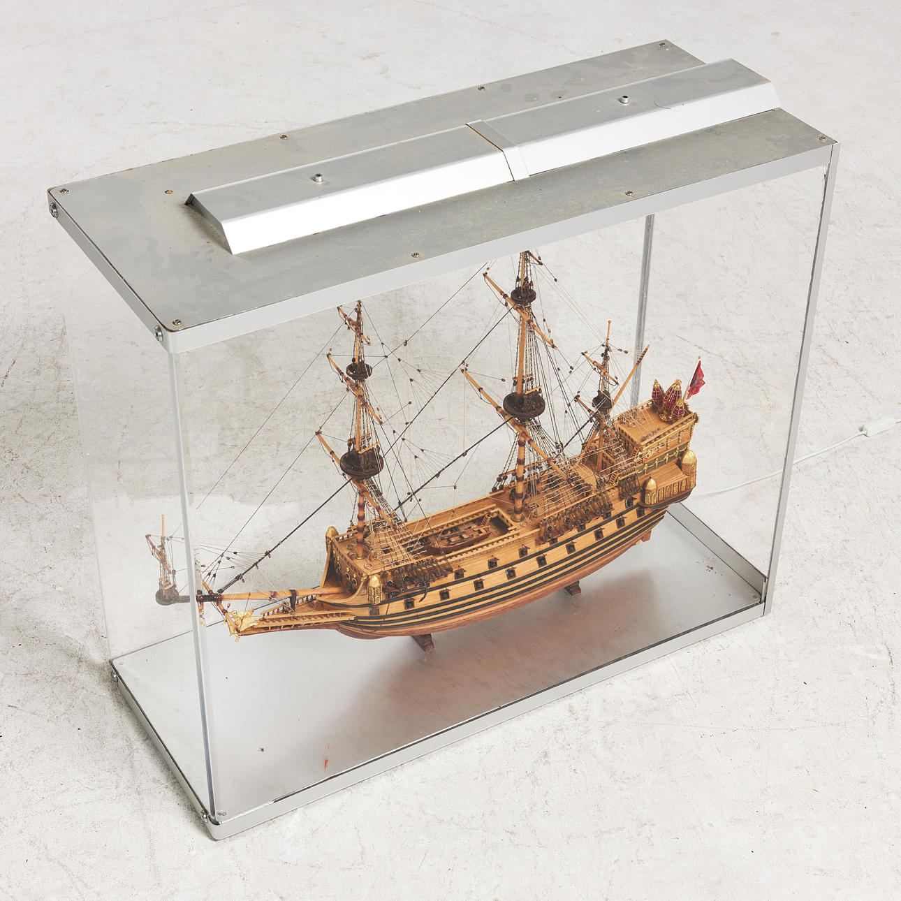 SHIP MODEL, mounted in stand, with lighting, gilded details ...