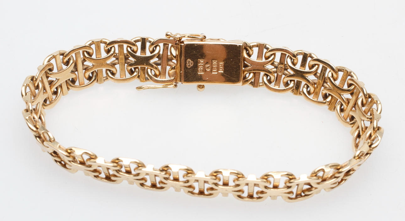 ARMBAND X-LÄNK MED STAV, 18k guld, vikt ca 31,8 gr.