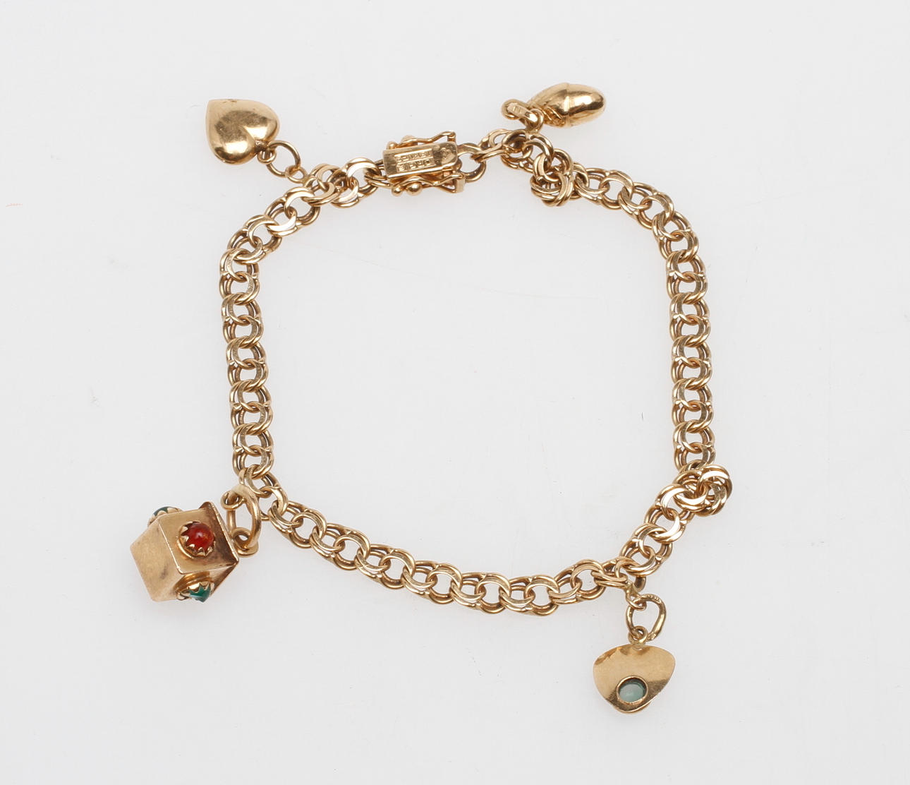 ARMBAND MED BERLOCKER, 18k guld, total vikt ca 10,8 gr.