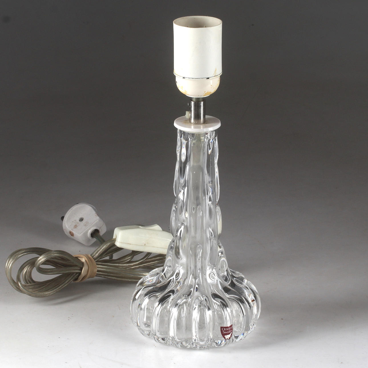 CARL FAGERLUND. Table lamp base, glass, Orrefors.