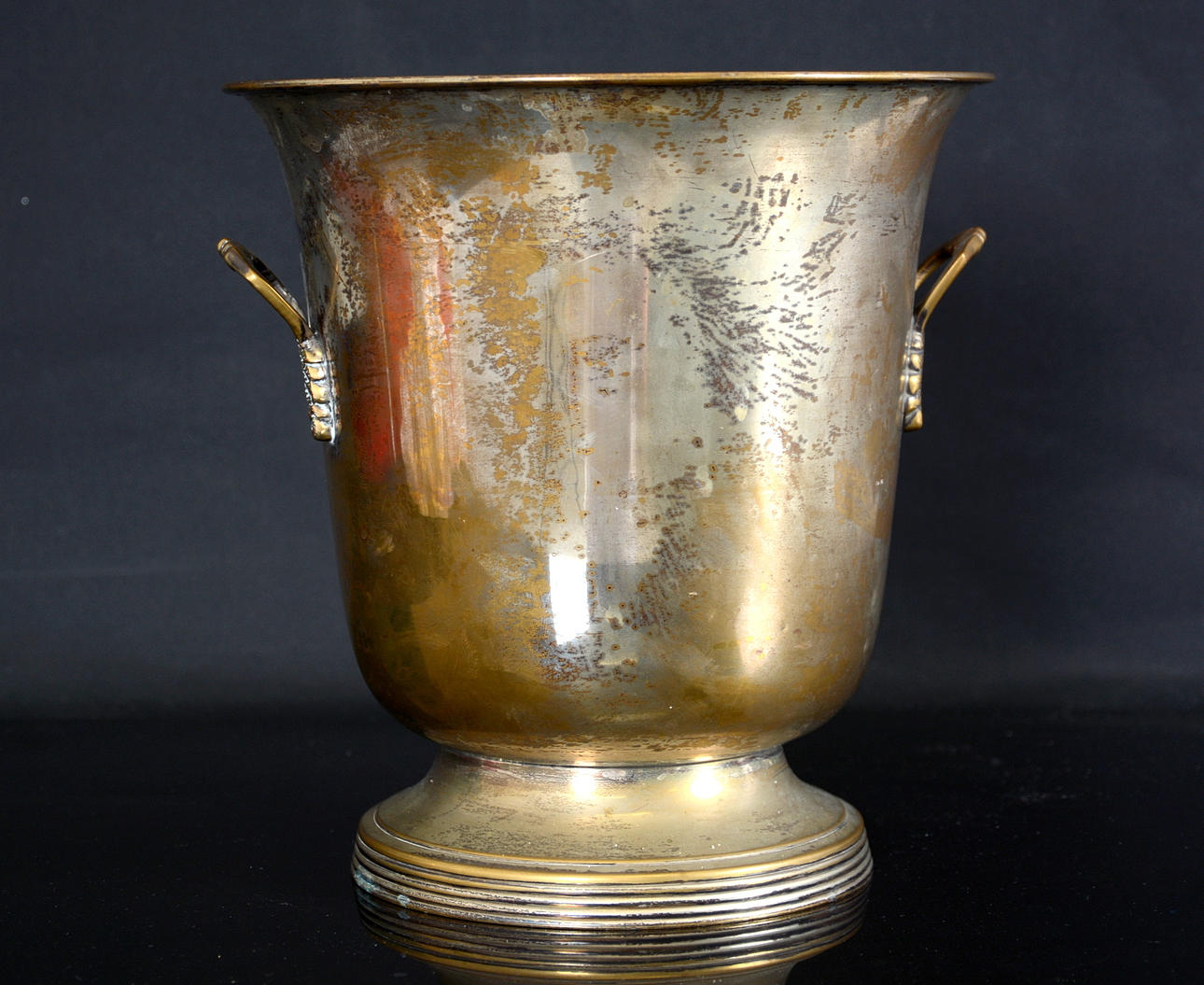 CHAMPAGNEKYLARE, försilvrad mässingH, 1900-talets första hälft.