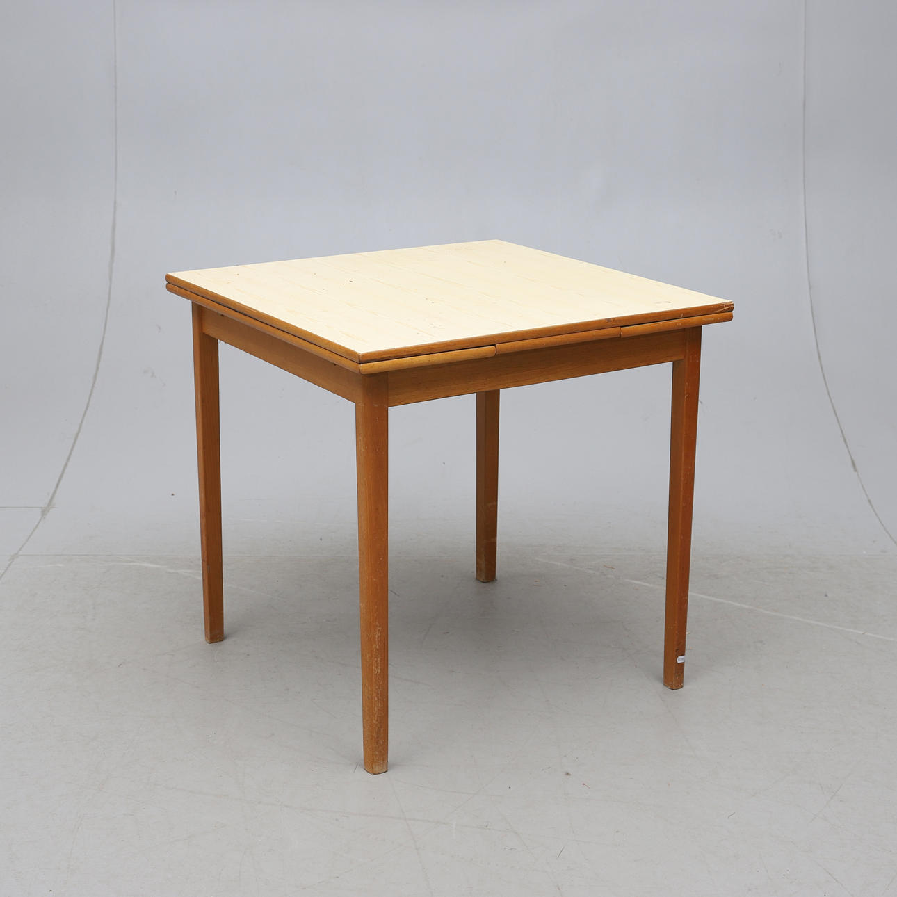 DINING TABLE, hardwood with so-called "Perstorps board", 1960s.