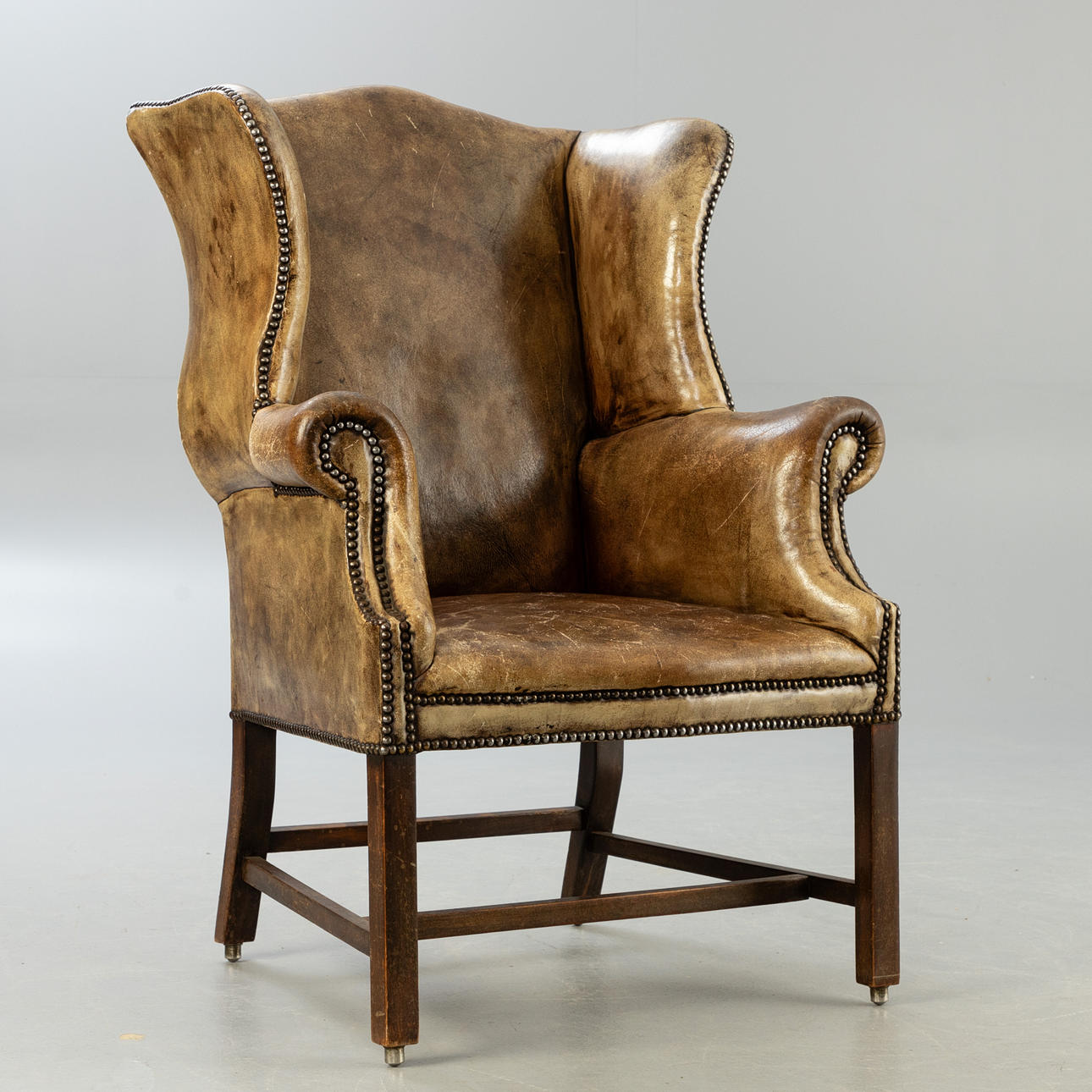 Öron kindstol, läder 1900-talet.