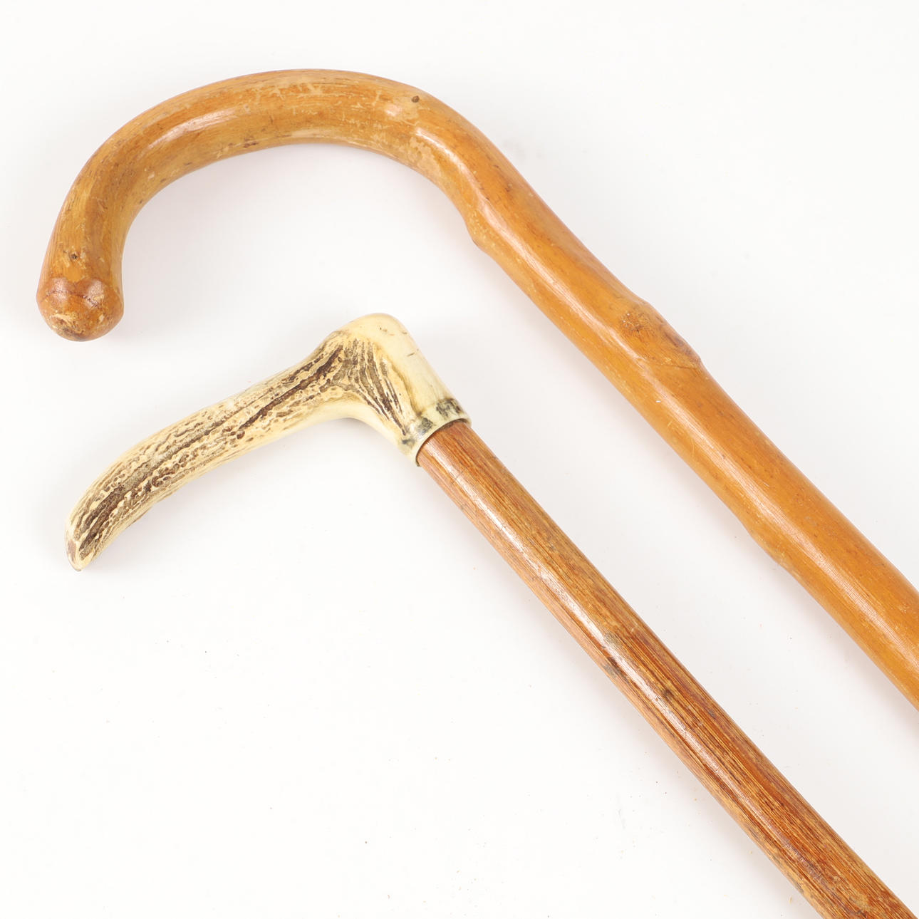 BASTONES, 2 piezas, madera/hueso, 1900.