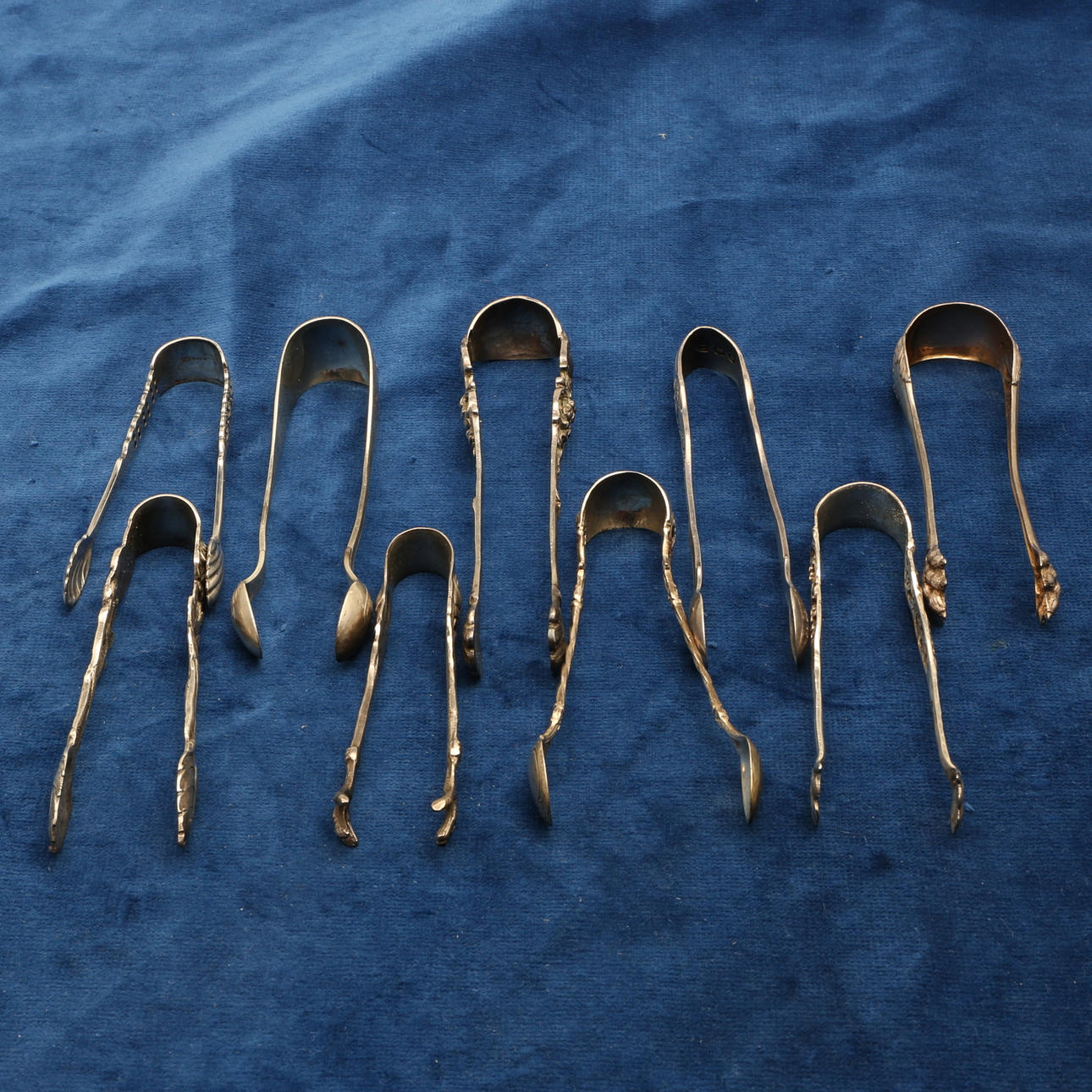 SOCKERTÄNGER, 9 st, silver, vikt ca 197 gram, 1900-tal.