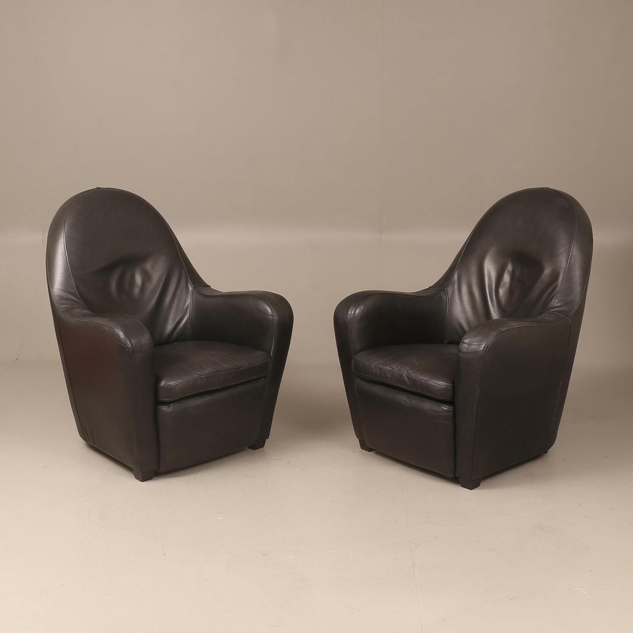 ARMCHAIRS, 2 pieces, leather, 2000s.