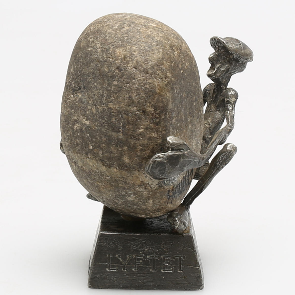 HENRY GUSTAFSSON. Skulptur i tenn och sten, "Lyftet" signerad Henry G, Wimmerby tenn, 1985.