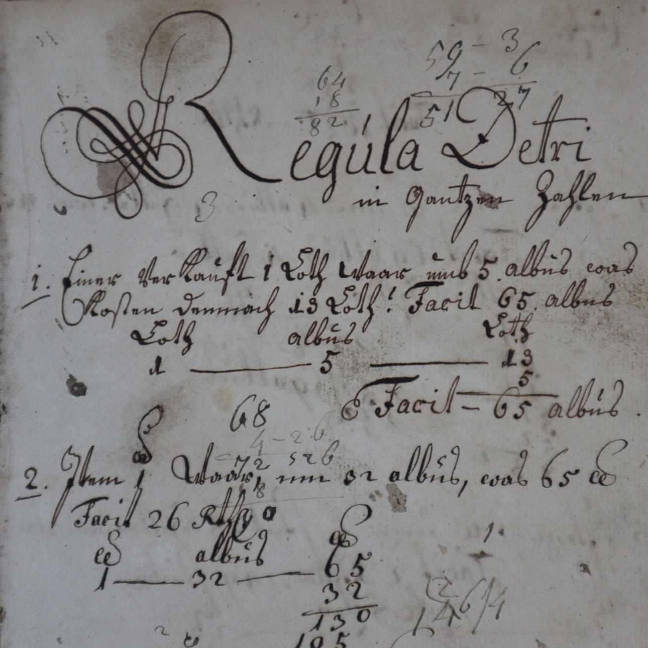 - BOOK with handwritten MATH notes “Regula Detri”.