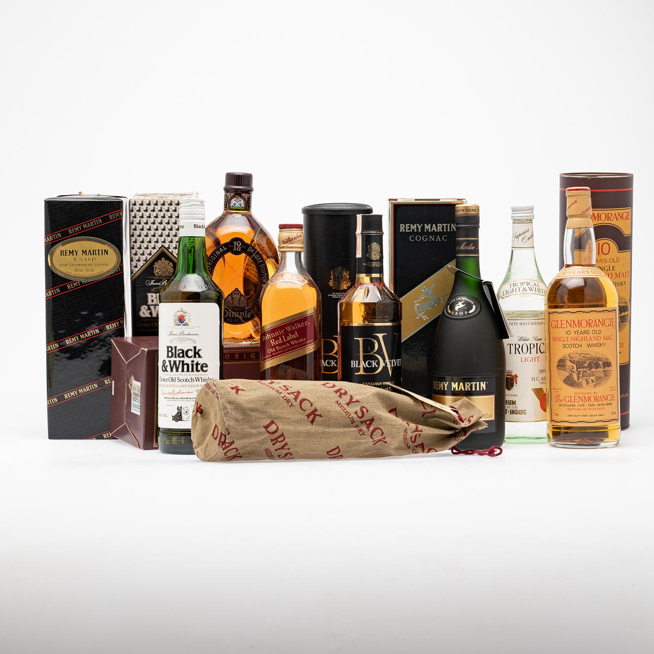 Nine-piece spirits collection, five whiskeys, one rum, one sherry, two cognacs (9).