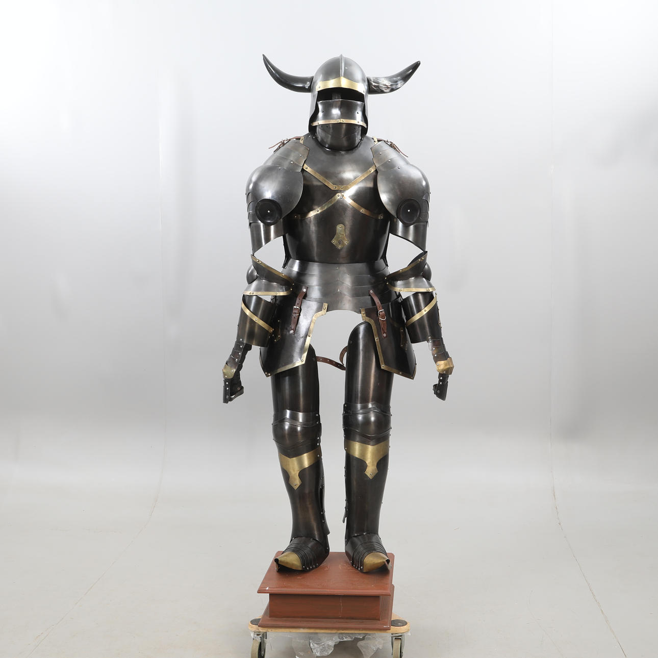 ARMOR, on wooden plinth.