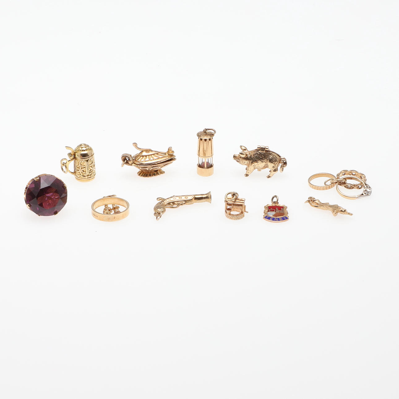 ELEVEN 9CT GULD CHARMS.