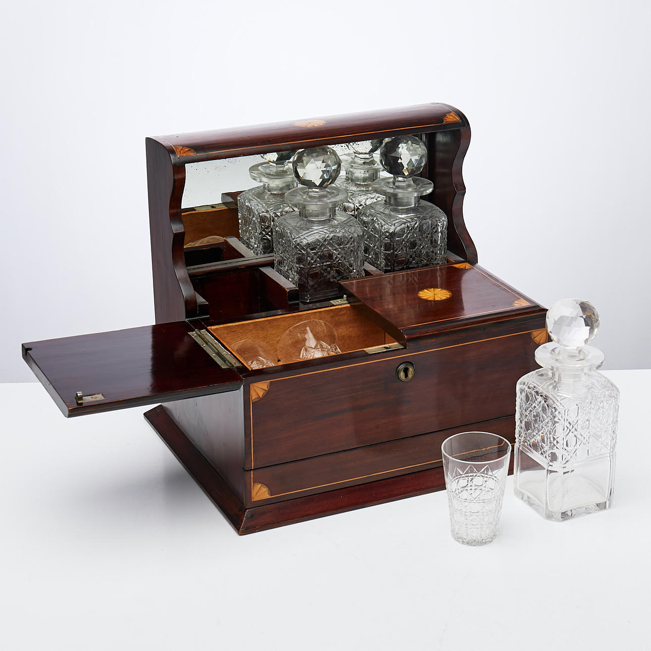 TANTALUS. 3 decanters and 3 glasses.