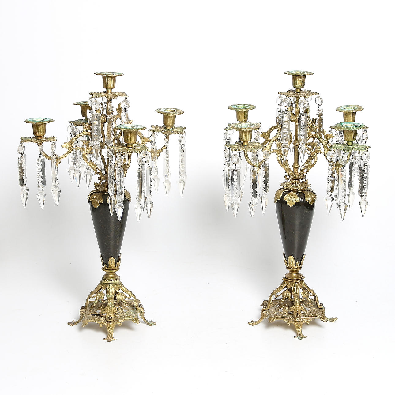 KANDELABRAR, ett par, brännförgylld metall samt svart marmor, Oskarianska. 1800-tal.