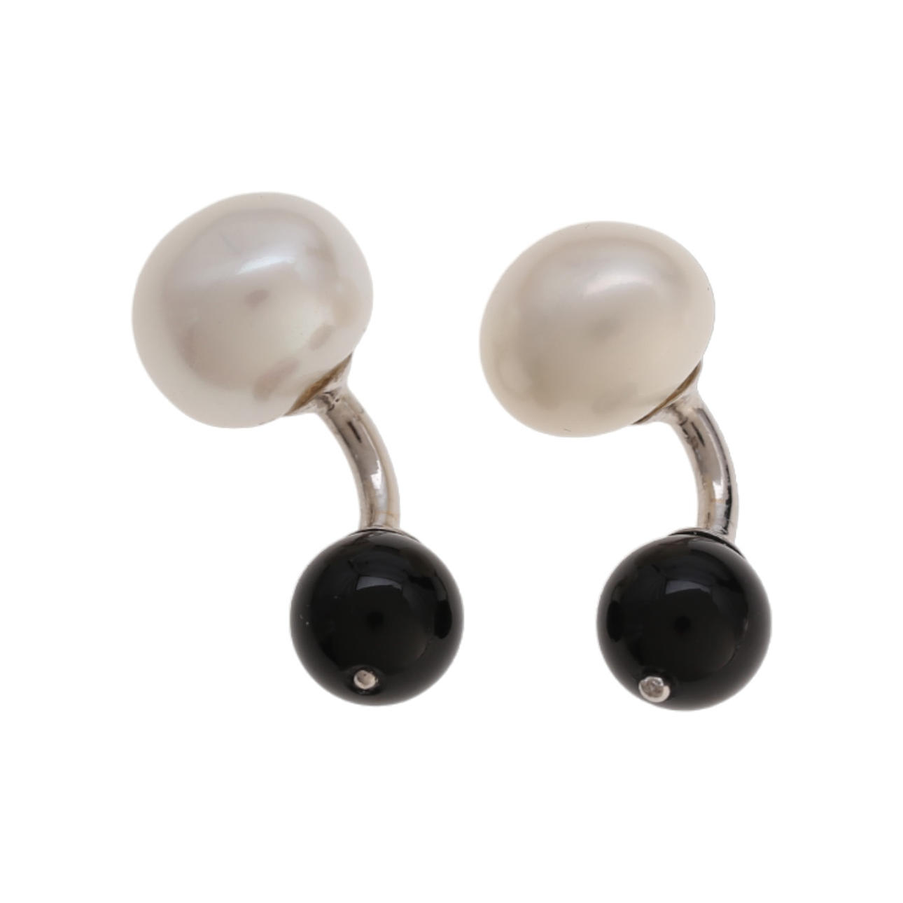 Manschettenknöpfe aus Perlen und Onyx.