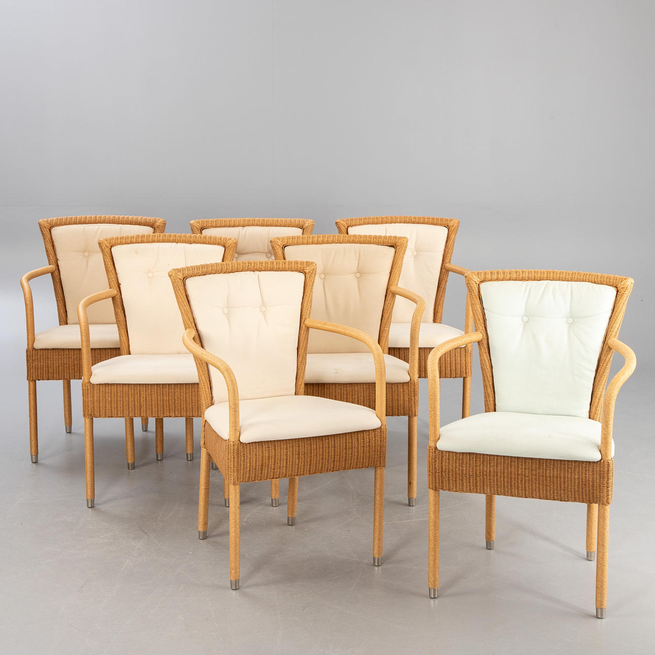 Accente, 7 Armlehnstühle / Korbstühle.