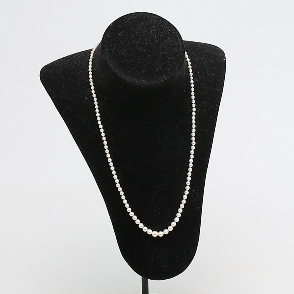 PÄRLCOLLIER av slatvattenpärlor, lås i 14K med 8 diamanter.