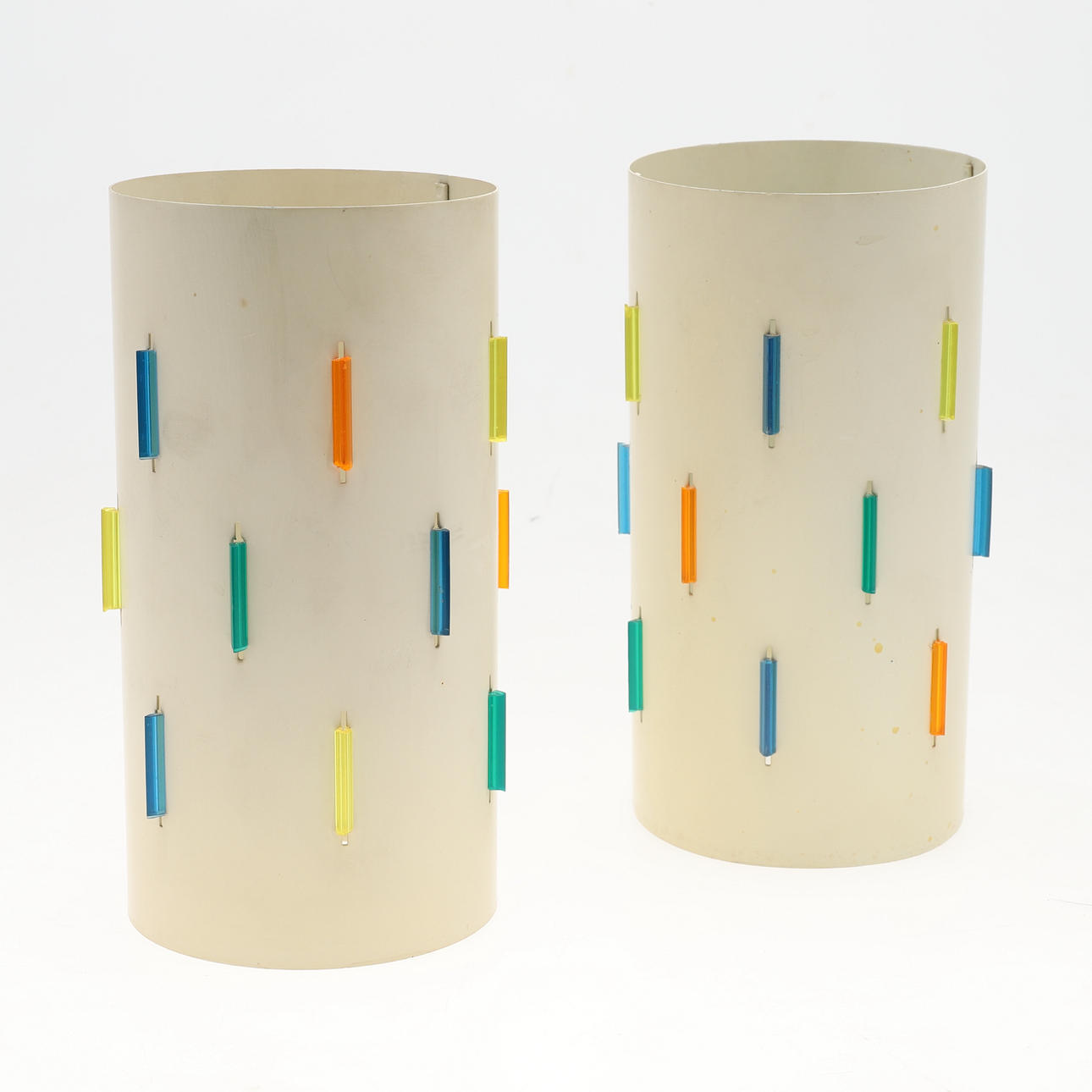 JOHN AND SYLVIA REID FOR ROTAFLEX. A PAIR OF 1950’S INTERPLAY STEEL AND PERSPEX LIGHT SHADES.