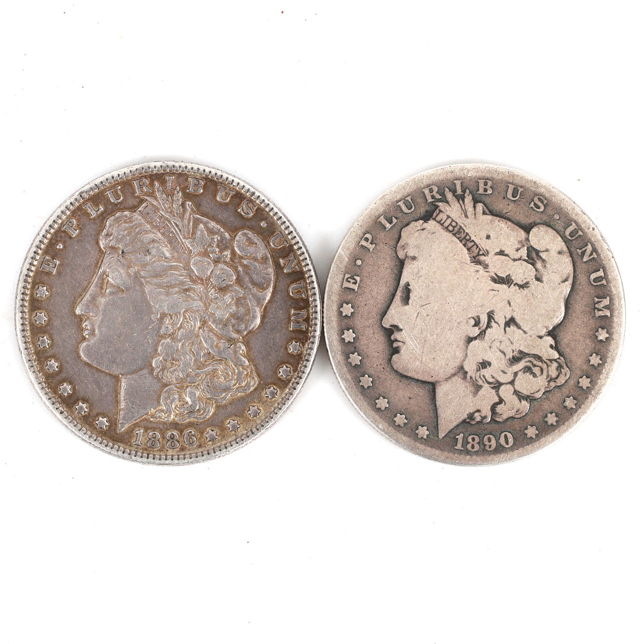 MONEDA DE PLATA, 2 uds. Dólar Morgan 1886 y -90.
