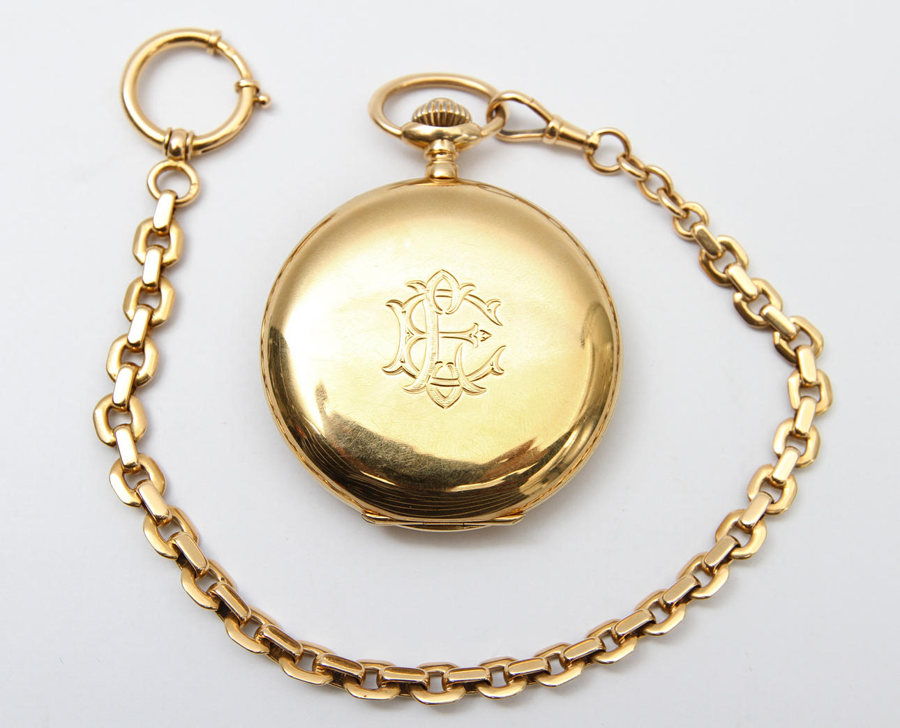 FICKUR. 18k guld samt klockkedja 18k, ca 134 gram brutto.