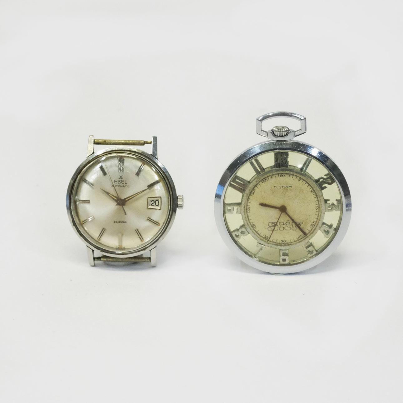 TWO WATCHES. EBEL AS WELL AS NIVRAM.
