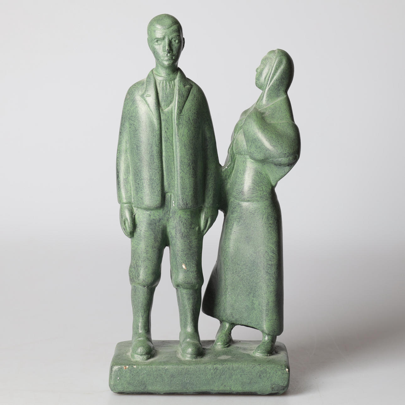 AXEL OLSSON. "The emigrants", patinated plaster, signed.