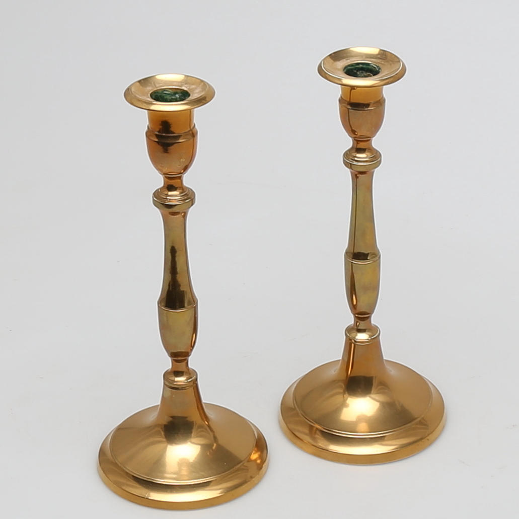 LJUSSTAKAR i mässing, ett par, Skultuna.