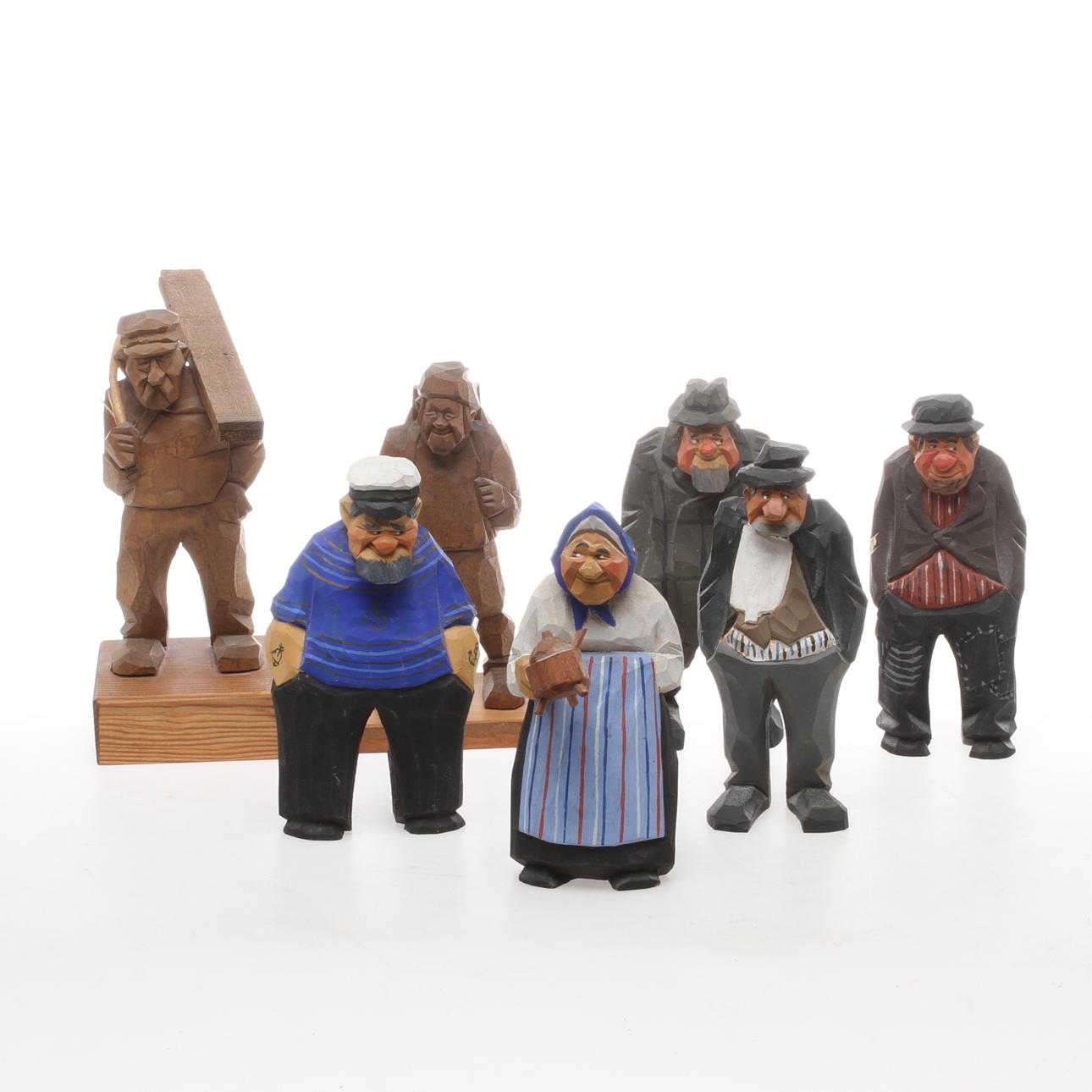FIGURINER, 7 st, skuret och delvist bemålat trä, samtliga signerade Bengt Råsten.