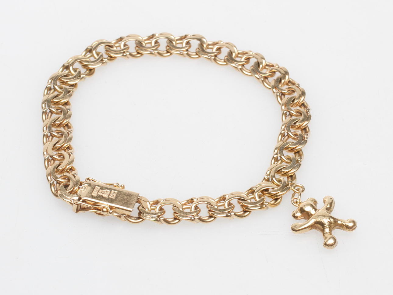 ARMBAND BISMARCK MED EN BERLOCK, 18k guld, vikt ca 20 gr.