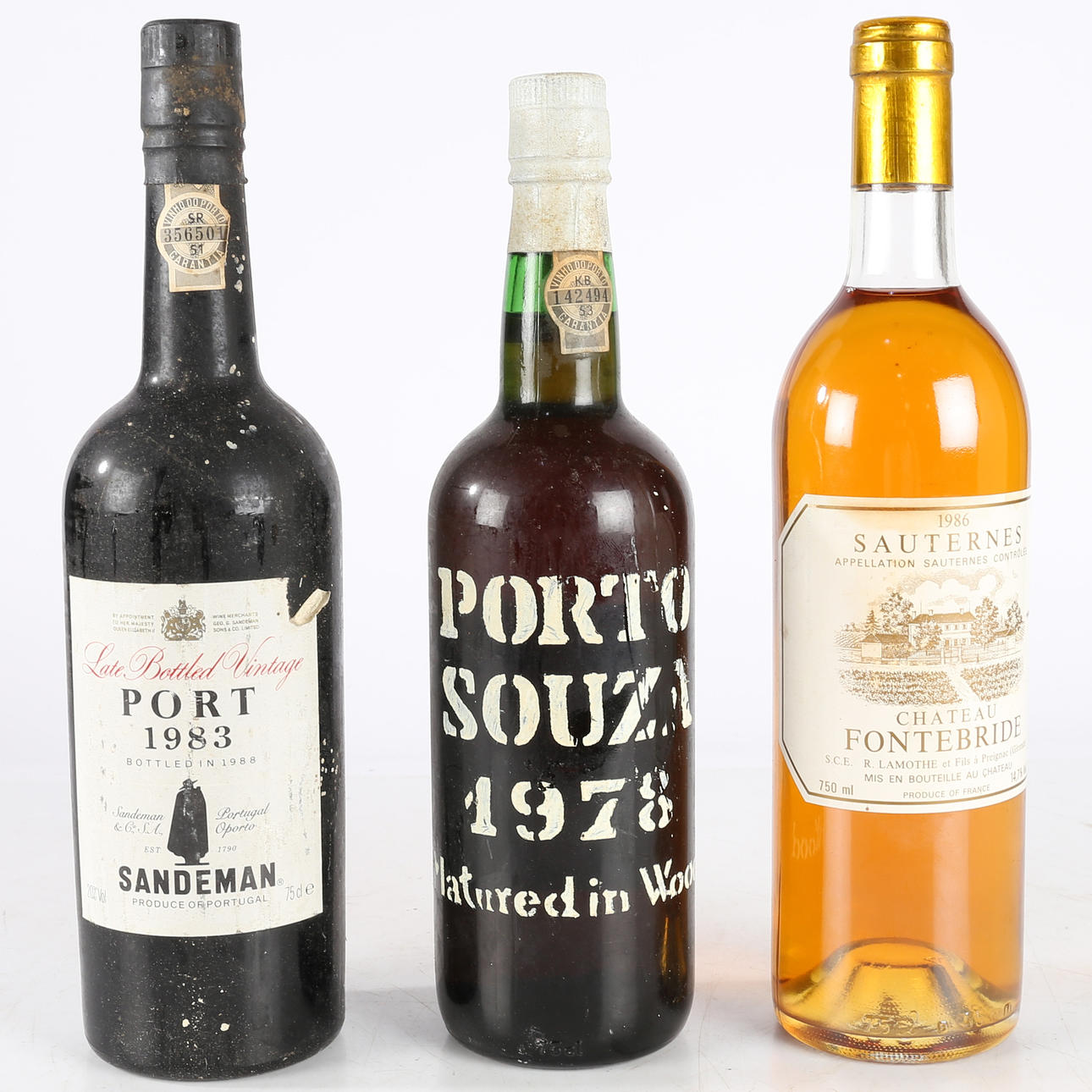 TWO BOTTLES OF PORT AND ONE WINE.