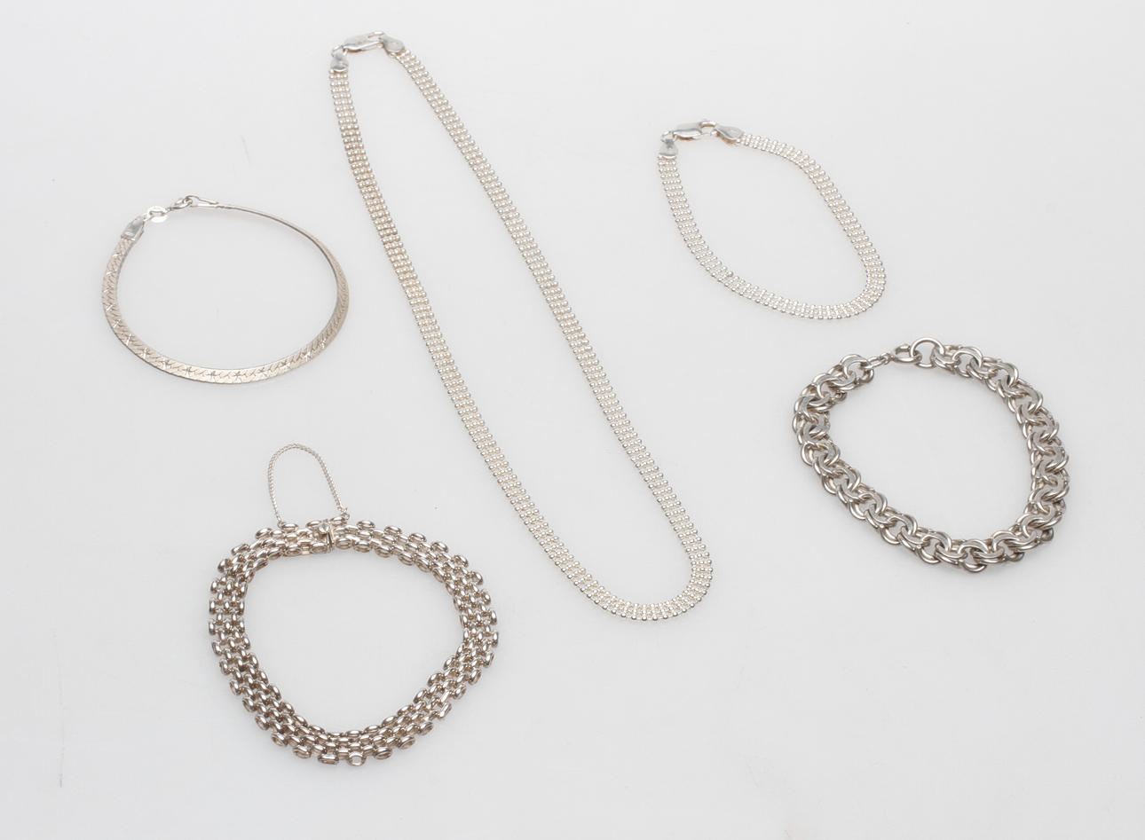 SILVERSMYCKEN, VIKT CA 57,5 GR.