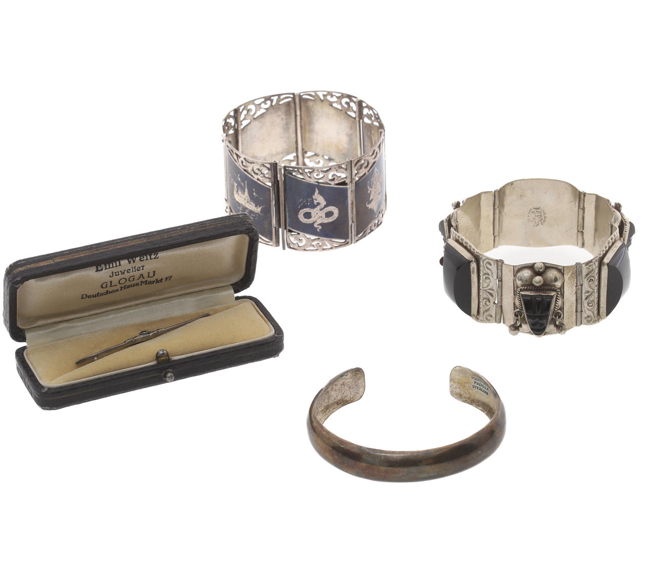 MARY-RITA PADILLA. A SILVER CUFF BANGLE.