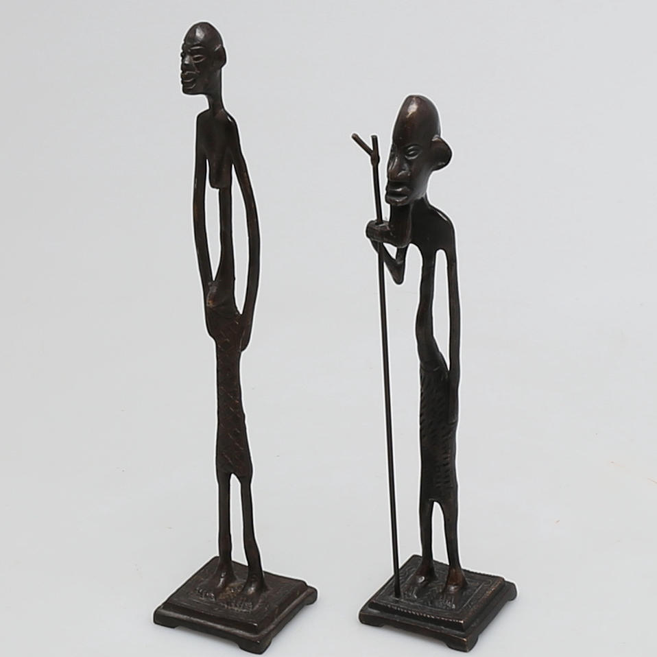 SKULPTURER i brons, 2 st, afrikansk kvinna och man, modern tillverkning.