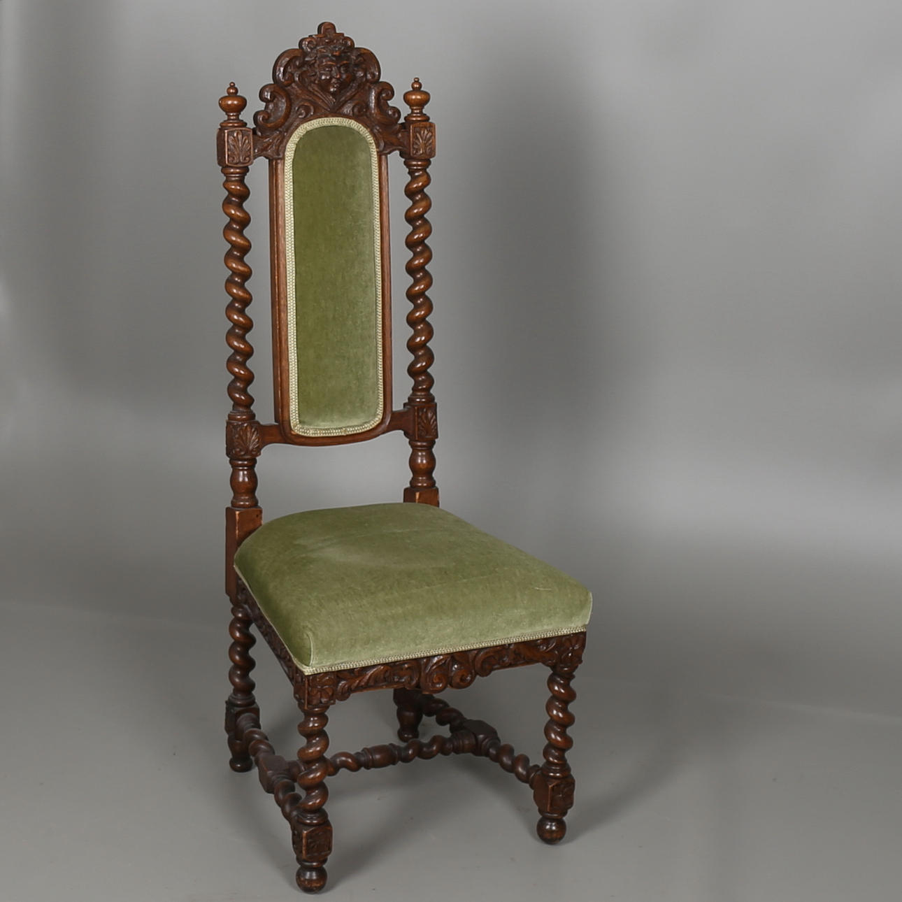 HÖGRYGGAD STOL i ek, barockstil, sent 1800-tal.