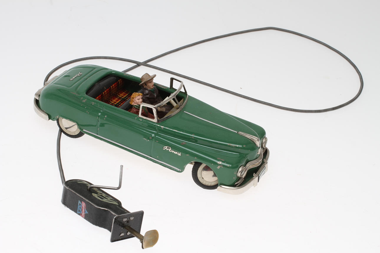 ARNOLD PRIMAT grön plåt, 2 figurer, körkontroll.