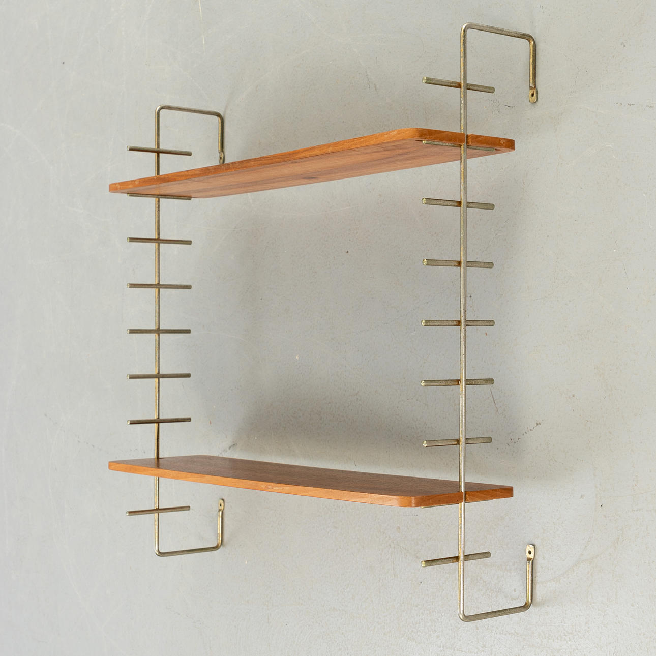 Small teak wall shelf. Mid-century design.