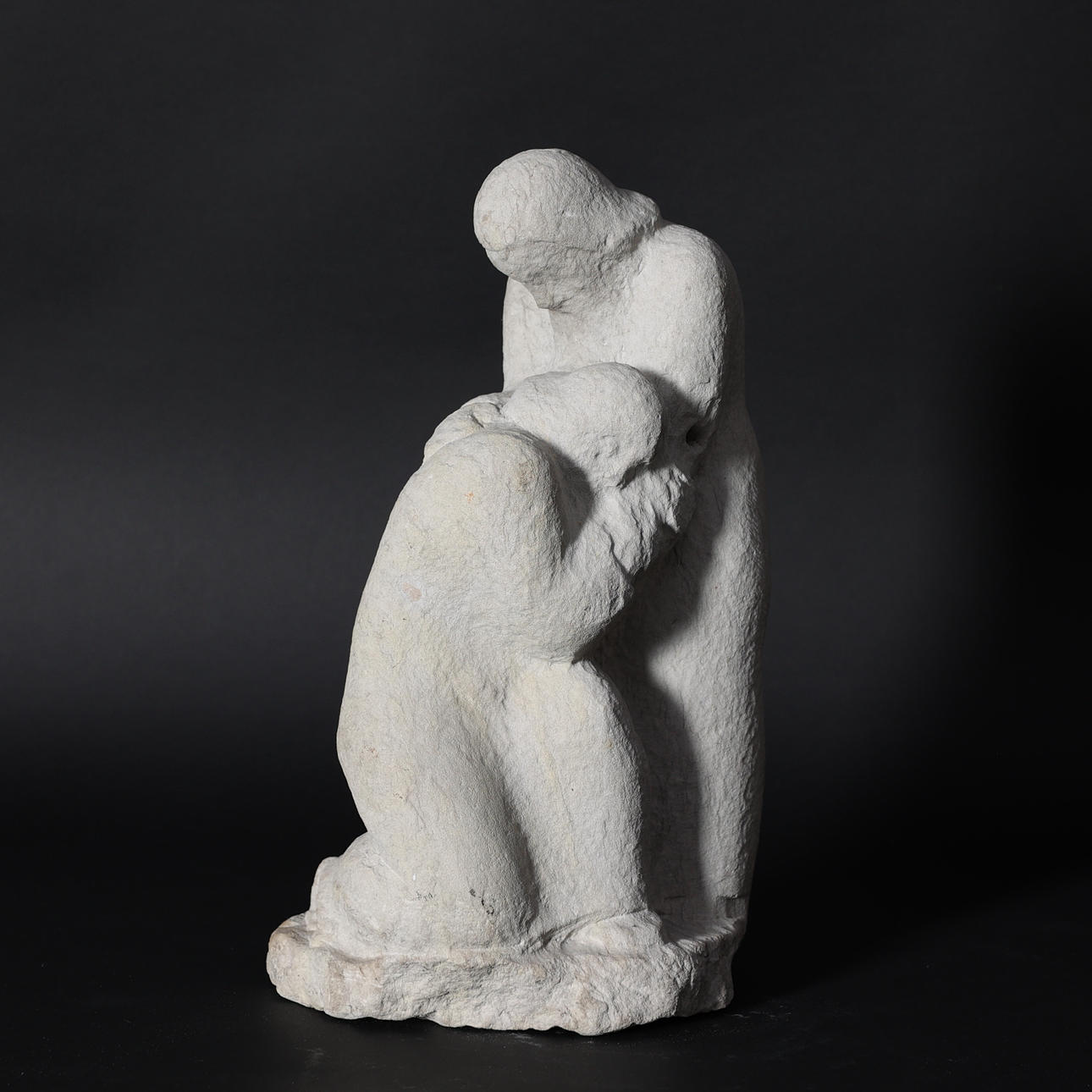HELGE HÖGBOM. Sorrow, sandstone, signed.